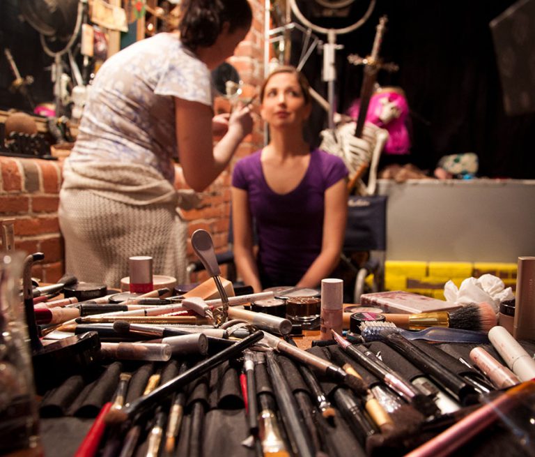 Catherine Moniz on MUA duties with Dakota Shepard in the makeup chair...