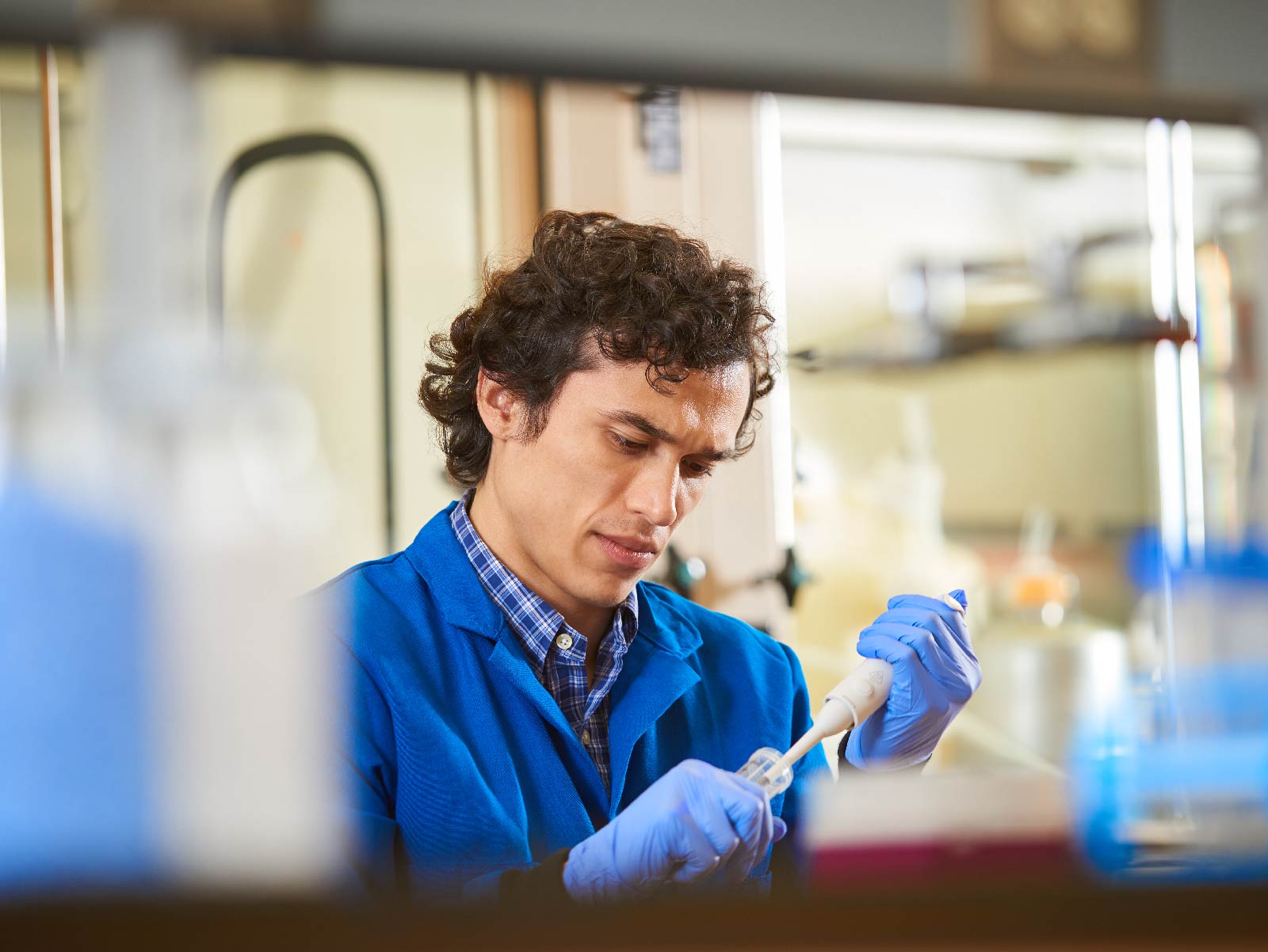 Lab Technician Pippetting: secrets to great branding Lab photography