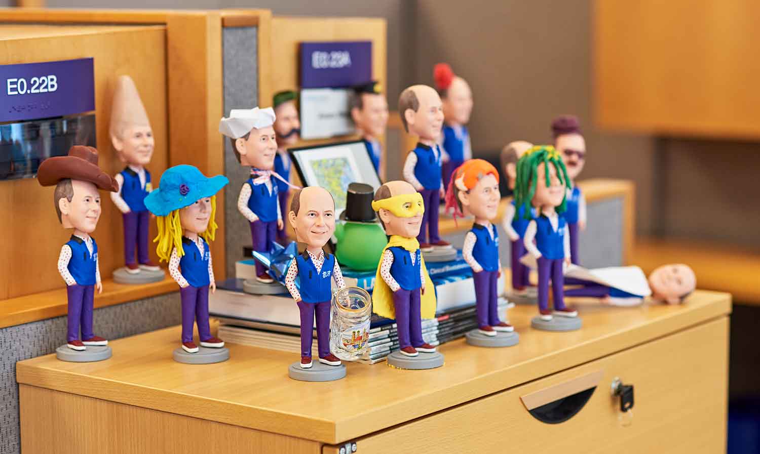 Corporate Culture Photography includes office decor, such as CEO bobbleheads