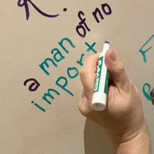 A Man of No Importance, Adam Sell writing on the white board